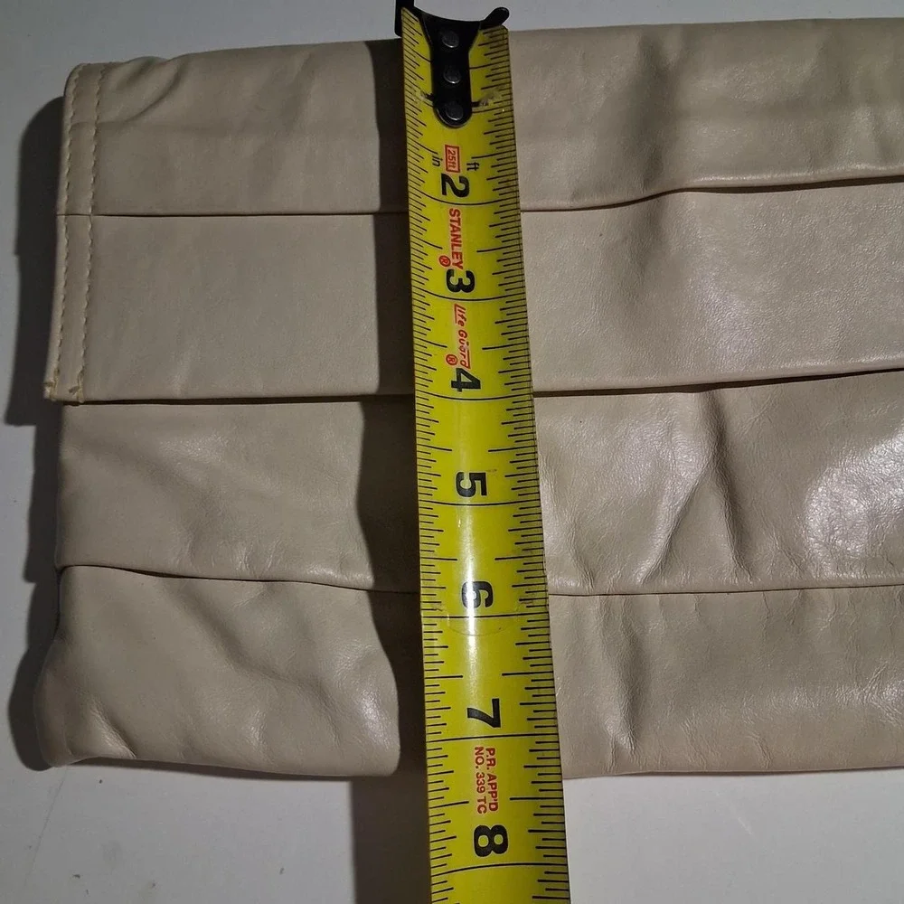 Womens 90s leather clutch bag with a boho vibe tan/cream
